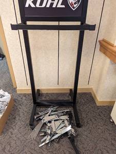 Metal framed portable retail display with metal bracket accessories