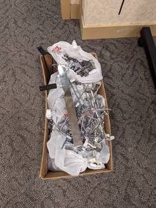 Lot of assorted metal retail hangers and hooks