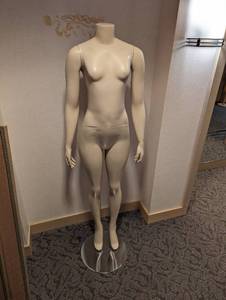 5ft headless female mannequin with base and multi-position capabilities