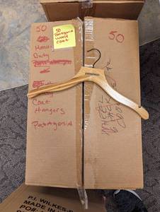 Large box of heavy duty wood Patagonia shirtcoat hangers