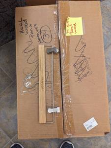 Large box of heavy duty wood Kuhl pant hangers