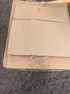 Large box of 18 x 7 x 19 recycled natural Kraft top handle shopping bags