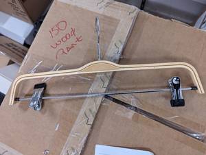 Large box of wood pants hangers