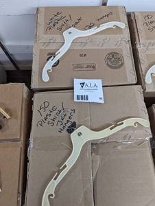 (2) large boxes of plastic shirtcoat hangers