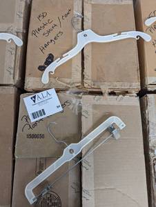(2) large boxes of assorted plastic pant and shirtcoat hangers