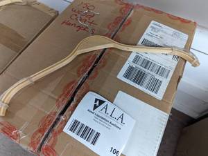 Large box of wood shirtcoat hangers