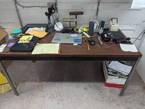 Metal framed office tabledesk with wood style top approximately 60 x 30 (NO CONTENT)