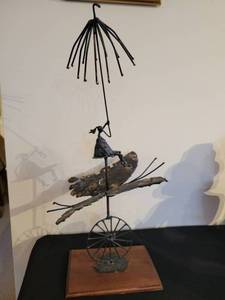 lot 23 image: Whimsical Metal Sculpture of a Figure with Umbrella on Unicycle