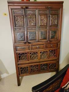 lot 41 image: Vintage Carved Wooden Cabinet with Intricate Detailing