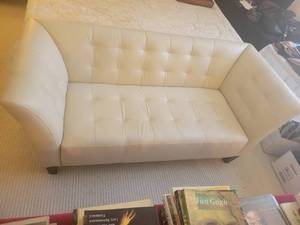 lot 42 image: Chateau DAx Upholstered Loveseat Sofa and Decorative Ceramic Table Lamp