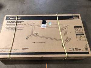 Husky 62 in. W x 24 in. D Adjustable Height Solid Wood Top Workbench Table in Black Customer Returns See Pictures