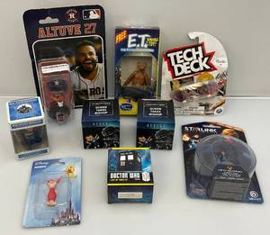 lot 30 image: Misc. Toy Collectibles (NIB) Including E.T. & More