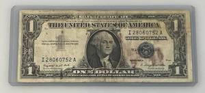 lot 57 image: 1957 A  $1 Dollar Silver Certificate In Holder
