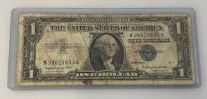 lot 62 image: 1957 A  $1 Dollar Silver Certificate In Holder
