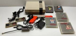 lot 94 image: Vintage Nintendo Entertainment System With Games & More