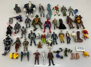 lot 128 image: Misc. Action Figures Including Star Wars & More