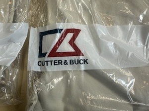 lot 33 image: Two pair Cutter and Buck Khaki Pants New in Bag (38x30)