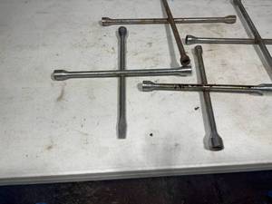 lot 56 image: Four Tire Irons