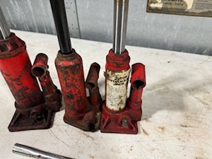 lot 69 image: Three Bottle Jacks