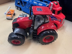 lot 44 image: Car Hauler with Tonka Jeep, Tonka Bucket Truck and Red Tractor