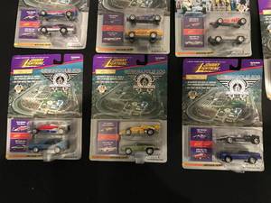LOT OF 7 NEW IN PACKAGE JOHNNY LIGHTNING DIE CAST CARS