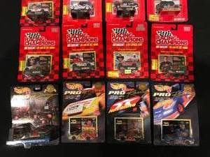 LOT OF 12 NEW IN PACKAGE DIE CAST CARS - LOOK