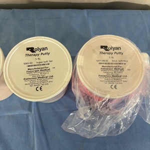 lot 42 image: MSRP $500  Lot of 4 Containers Mixed Color Patterson Medical 5 lbs. Rolyan Therapy Putty - &nbspImprove hand therapy with exercises like squeezing, stretching, twisting, and pinching therapy putty.