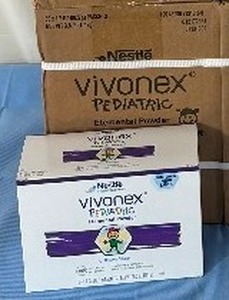 lot 125 image: MSRP $300  1 Case (36 Each Per Case) Nestle Health Science 6-Pack Boxes 1.7 oz. Vivonex Nutritionally Complete Pediatric Elemental Powder - Unflavored - Expiration 924