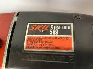 lot 114 image: Skil Reversible Hammer Drill Model 599 with Case and Drill Bits
