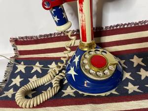 lot 231 image: Retro 1973 Red, White and Blue Rotary Candlestick Phone