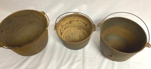 lot 299 image: Three Vintage Rusty Cast Iron Pots