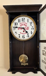 lot 19 image: Vintage Wooden Case Cool Coca Cola Wall Clock