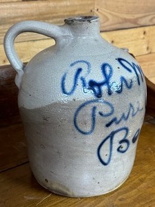 lot 9A image: John McHenry & Sons Rye Whiskey Stoneware Jug