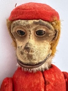 lot 23 image: Vintage Monkey Toys