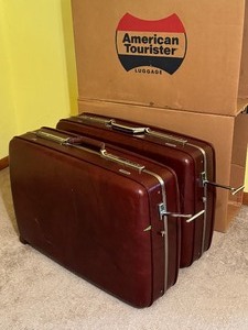 lot 310C image: Two Vintage Cranberry Tourister Suitcases with Wheels