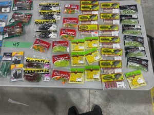 HUGE TABLE FULL OF FISHING PLASTICS