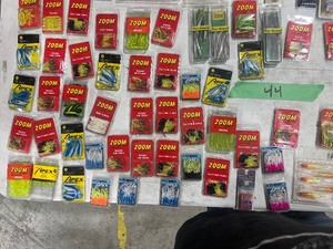 HUGE TABLE FULL OF FISHING PLASTICS