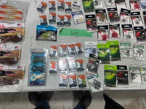 TABLE FULL OF FISHING EQUIPMENT