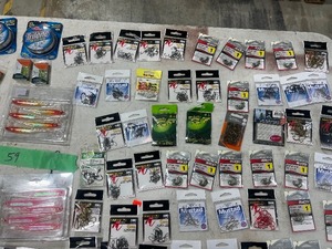 TABLE FULL OF FISHING TACKLE, HOOKS, PLASTICS, TRILENE, RODREEL, & 8 IN 1 COMBO KIT