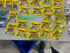 TABLE FULL OF FISHING EQUIPMENT