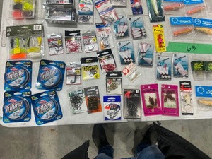 TABLE FULL OF FISHING EQUIPMENT