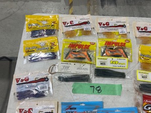 TABLE FULL OF FISHING PLASTICS