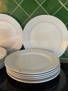 lot 194 image: Set of 12 White Crate and Barrel Chargers