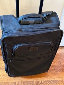 lot 137 image: Tumi Luggage