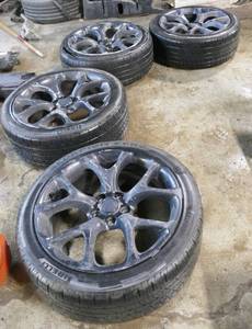 lot 23 image: Set of Pirelli 23545R20 tires and rims