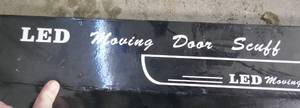 lot 26 image: New LED Moving door scuff