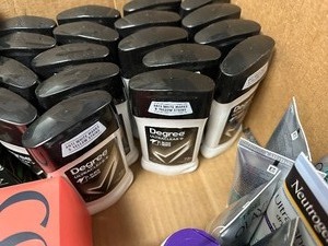 lot 13 image: Large Box of Large 2.7oz Degree Deodorant  Olay White Radiance  Cora Pads  Soap