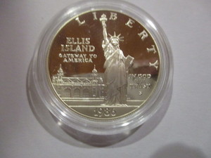 lot 23 image: 1986-S Statue of LibertyEllis Island Commemorative Silver Dollar