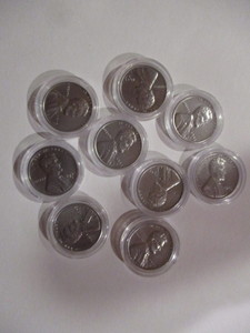 lot 28 image: Lot of (9) 1943- P, D and S Mint Steel WWII Emergency Issue Pennies (3 of each) in airtight capsules.