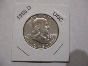 lot 32 image: 1958-D (Denver Mint) Franklin Silver Half Dollar - Cartwheel Effect and Original Mint Luster - Very Nice